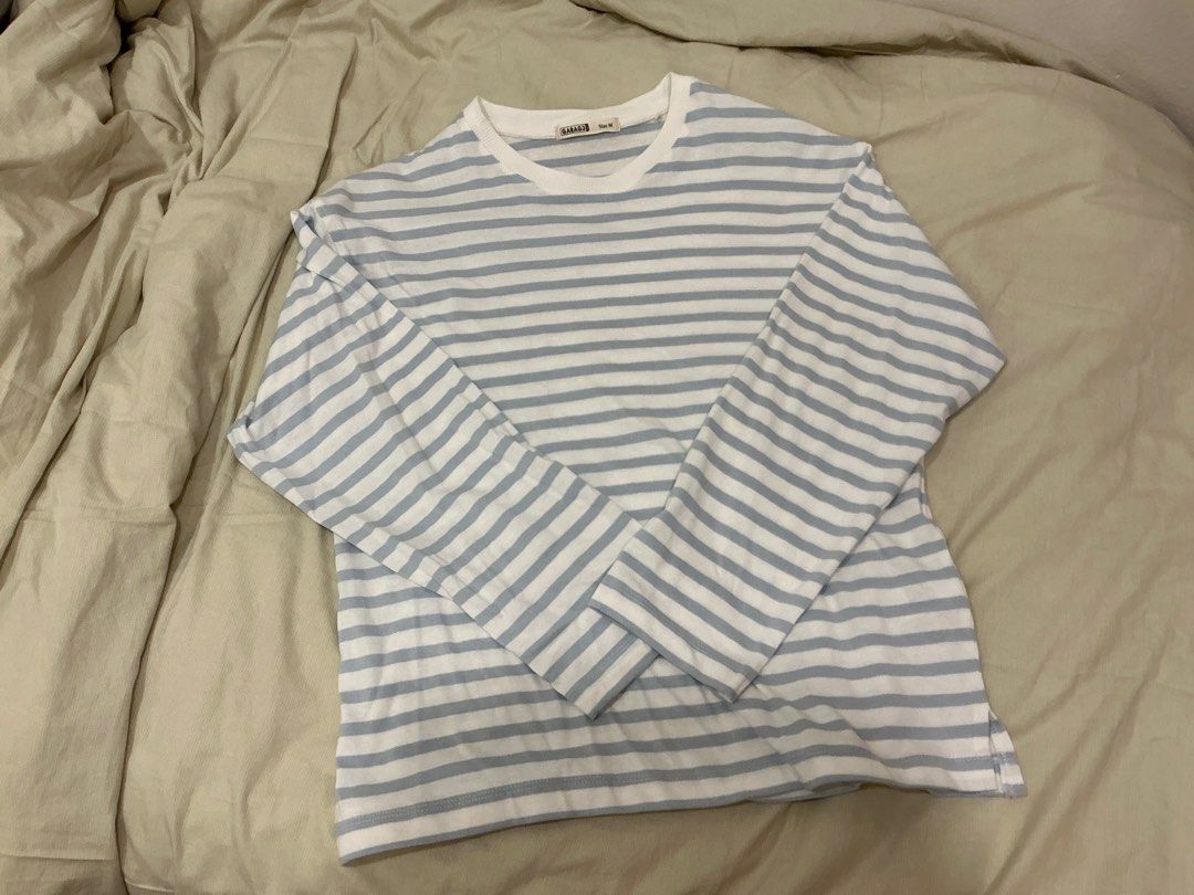 Long Sleeve Blue Stripes (Category: Longsleeves) located in Kuala Lumpur. Submitted by memee22 (Listing ID 1448638644, Image 1). Description: - Brand: Padini Garage - Type: Long Sleeve Top - Color: Blue and White Stripes - Size: M - Condition: Excellent, gently used - Style: Casual, versatile.