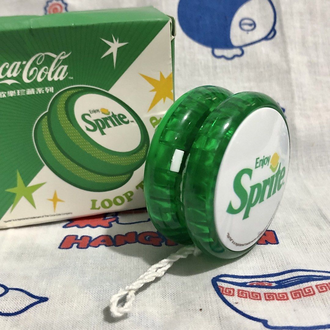 LOOP THE LOOP COCA-COLA SPRITE YOYO (Category: Vintage Collectibles) located in Quezon City. Submitted by kitsune.treasures (Listing ID 1448568926, Image 3). Description: *First to pay policy! *1 day reservation only. Failure to pay on time, auto cancel. 📍Quezon City * MOD: J&T | Lalamove * MOP: GCASH | BPI 📦ON HAND AND READY TO SHIP! CONDITION: WHAT YOU SEE IS WHAT YOU GET. Dimensions: Kindly check the photos for the actual measurements. Pleas