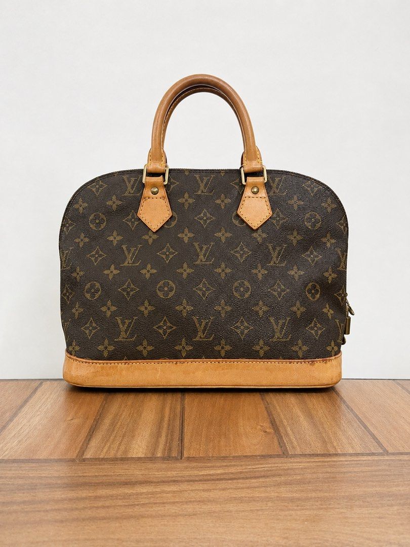 Louis Vuitton Alma Monogram (Category: Luxury Bags & Wallets) located in Paranaque City. Submitted by katlouieleandicho (Listing ID 1448594974, Image 1). Description: Louis Vuitton Alma PM Monogram Canvas Beautifully maintained Louis Vuitton Alma PM in iconic Monogram canvas. The canvas remains clean and vibrant, with sturdy handles, smooth zipper, and functional hardware. The vachetta leather has developed a lovely honey patina over time, giving