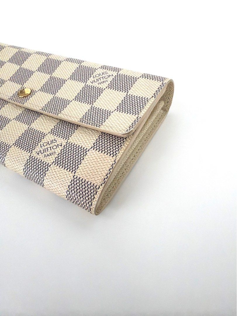 Authentic Louis Vuitton Damier Azur Wallet (Used) (Category: Luxury Bags & Wallets) located in Quezon City. Submitted by shoppingcartmnl (Listing ID 1448535708, Image 3). Description: - Authentic Louis Vuitton Wallet - Damier Azur Canvas - Snap Closure - Multiple Interior Card Slots - Zippered Coin Pocket - Made in Spain - Clean Interior and Exterior - Ideal for Everyday Use.