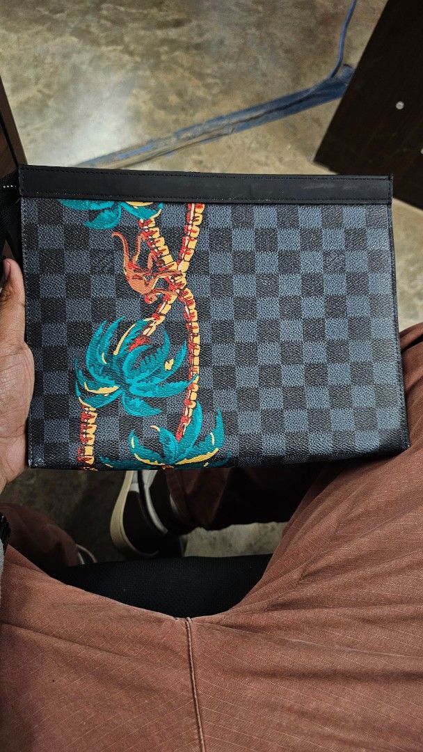 Louis Vuitton Damier Graphite Palm Springs Wallet (Category: Luxury Bags & Wallets) located in Kibawe. Submitted by Thrift_ni_Babac (Listing ID 1448503335, Image 2). Description: - Louis Vuitton Wallet - Damier Graphite Canvas with Palm Springs Print - Secure Zip Closure - Multiple Interior Card Slots - Made in France - Model Number: M6017 - Ideal for keeping essentials organized - See last 2 photos for minimal issue - 10.5 in. (W) x 8.5 in. (Hei