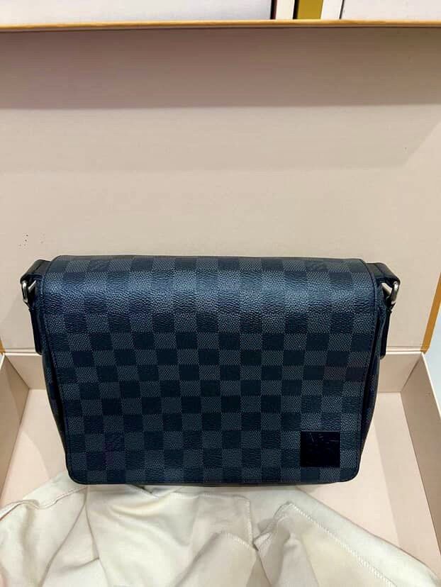 Louis Vuitton District Pm (Category: Luxury Bags & Wallets) located in Quezon City. Submitted by _legitAF (Listing ID 1448566971, Image 2). Description: For sale only!! LATEST MODEL Louis Vuitton District PM (Version 3) Damier Graphite 9.3/10 condition Retails around 130k Complete with Receipt Authentic Money back!! Meet up preferably in Sun Residences Condo, QC area .
