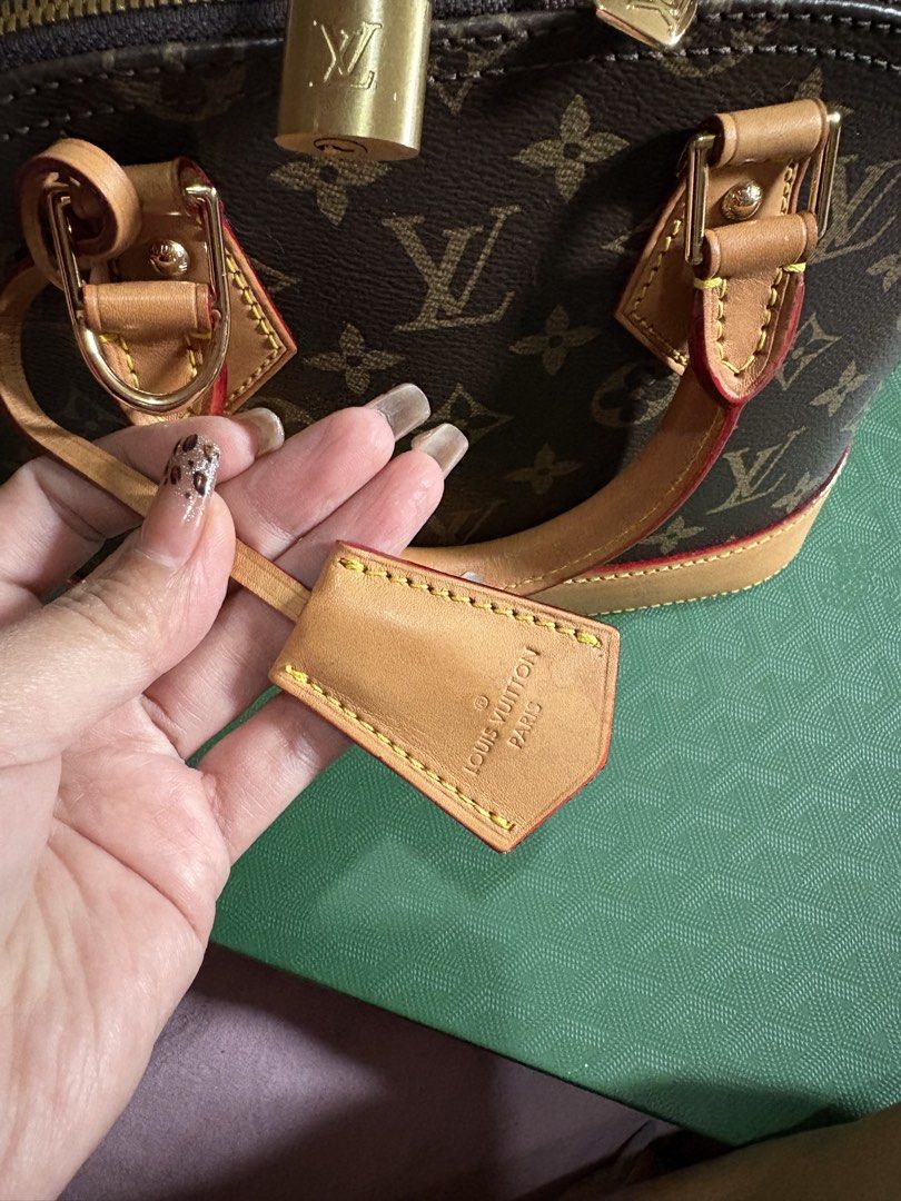 Louis Vuitton Monogram Alma BB Handbag (Category: Luxury Bags & Wallets) located in Quezon City. Submitted by gladystee (Listing ID 1448534592, Image 3). Description: - Classic Louis Vuitton Alma BB bag - Monogram canvas with vachetta leather trim - Gold hardware - Includes original lock and keys - Detachable strap for shoulder or crossbody wear - Ideal for daily use or special events - A timeless and iconic handbag - very well loved! .
