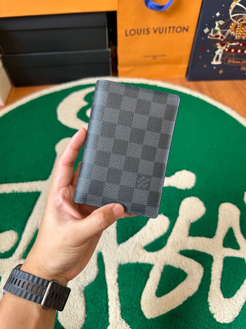 LV Damier Graphite Passport Holder (AUTHENTIC) (Category: Luxury Bags & Wallets) located in Cavite. Submitted by southsnkr (Listing ID 1448583585, Image 1). Description: Louis Vuitton Damier Graphite Passport Holder Gently Used Unit only ₱9,500 only Cavite / Bulacan 📍 Add for shipping Mode of Payment: BPI | G-cash 𝗔𝗹𝗹 𝘁𝗿𝗮𝗱𝗲𝗺𝗮𝗿𝗸𝘀 𝗮𝗻𝗱 𝗹𝗼𝗴𝗼𝘀, 𝗶𝗻𝗰𝗹𝘂𝗱𝗶𝗻𝗴 𝘁𝗵𝗼𝘀𝗲 𝗼𝗳 𝗡𝗶𝗸𝗲, 𝗔𝗱𝗶𝗱𝗮𝘀, 𝗮𝗻𝗱 𝗼𝘁𝗵𝗲𝗿 𝗯𝗿𝗮𝗻�