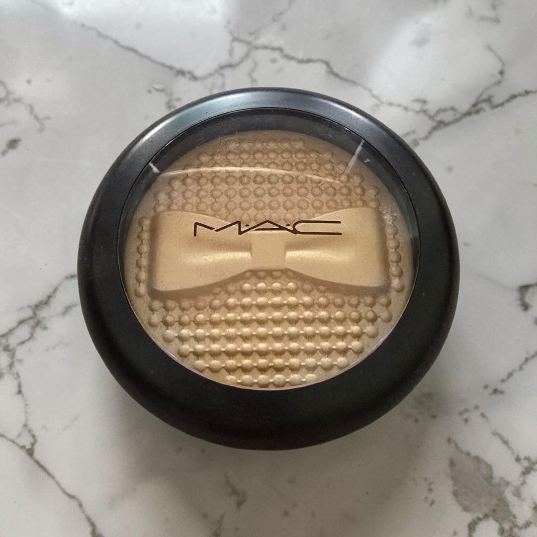 MAC Bubbly, Please Extra Dimension Skinfinish Highlighter (Category: Makeup) located in Taguig. Submitted by altainfante (Listing ID 1448579043, Image 2). Description: - MAC highlighter in shade Bubbly, Please - Features the signature Extra Dimension Skinfinish formula - Adorable embossed bow design - Perfect for achieving a radiant glow - Made in Italy.