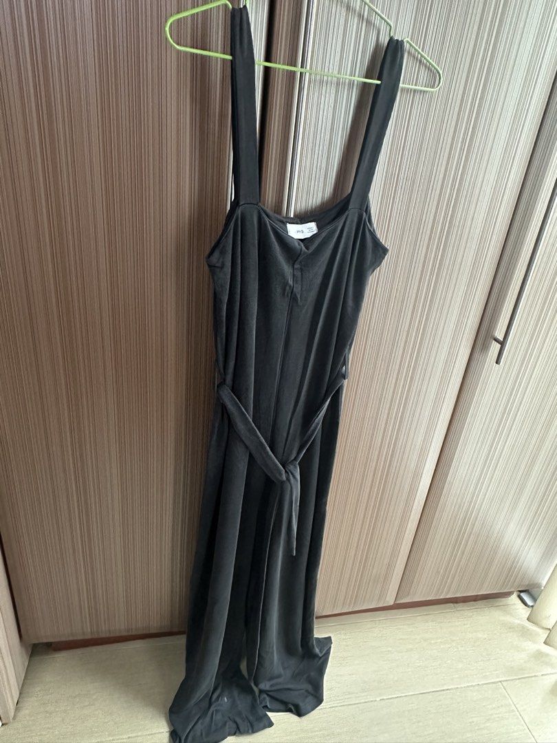 Mango Black Wide Leg Jumpsuit Size S (Category: Jumpsuits) located in Taguig. Submitted by stigmapanda (Listing ID 1448694302, Image 1). Description: - Mango black wide leg jumpsuit - Size S - Adjustable straps - Tie waist - Made in Turkey - Perfect for casual outings or dressing up.