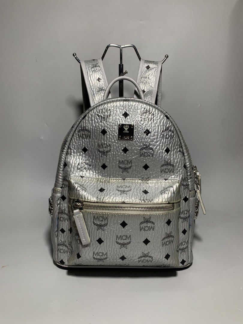 MCM MINI STARK SILVER BACKPACK (Category: Luxury Bags & Wallets) located in Taguig. Submitted by thehookv1 (Listing ID 1448553112, Image 1). Description: MCM MINI STARK BACKPACK VERY GOOD CONDITION AUTHENTIC BAG ONLY TAGUIG DM ME .