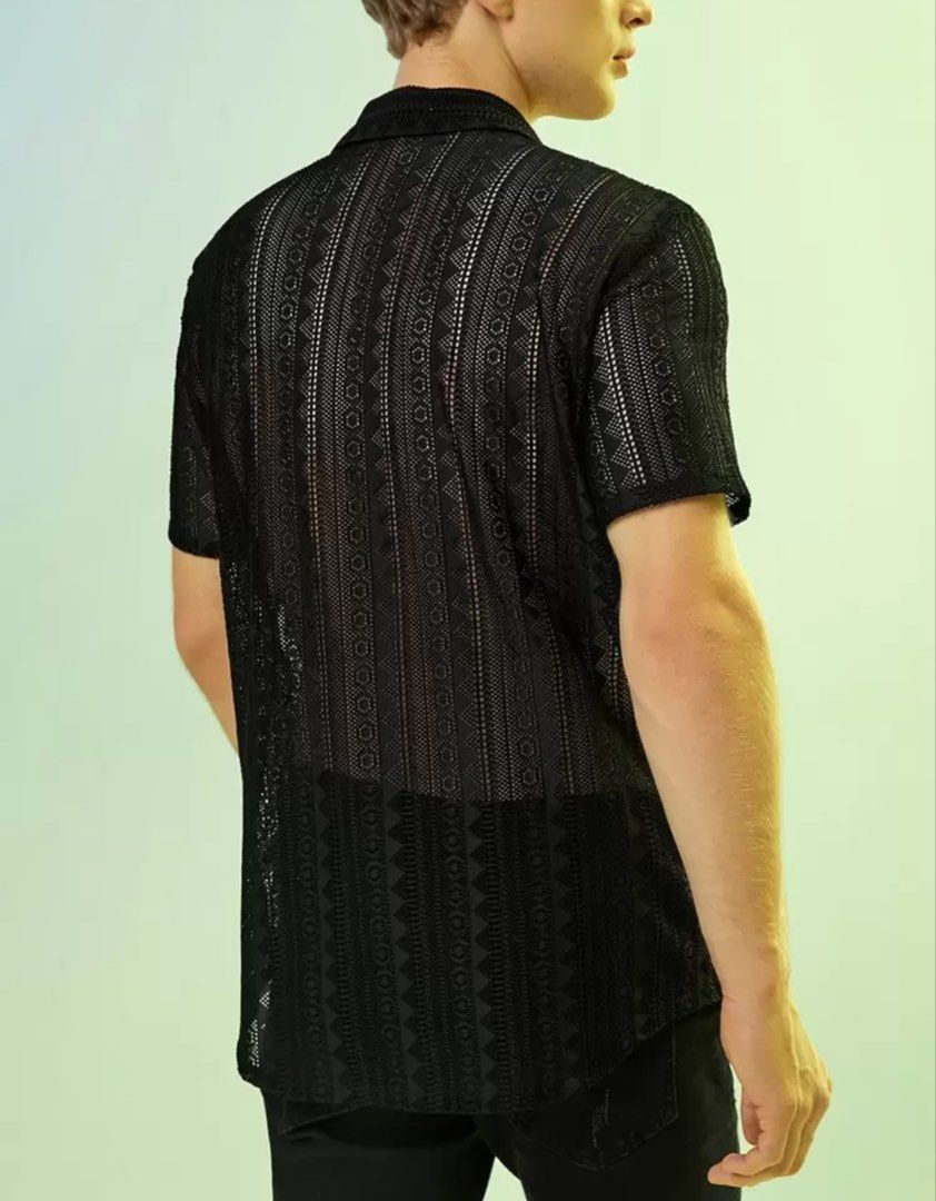 Men hollow out summer shirt (Category: Tshirts & Polo Shirts ) located in Rizal. Submitted by jaimsolshop (Listing ID 1448667756, Image 2). Description: - Cool black crochet shirt - Short sleeves - Button-up front - Unique all-over geometric pattern - Lightweight and breathable material - Versatile: great for layering or wearing solo - Perfect for beach vibes or a night out - Can fit Med to XL.