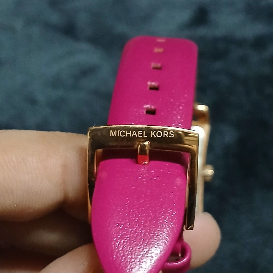 Authentic Michael Kors Monroe Square Electric Pink Leather Watch (Category: Women's Watches) located in Cagayan de Oro. Submitted by susanthrifts (Listing ID 1448611270, Image 3). Description: -Authentic Michael Kors Watch - Rose Gold Tone Casing - Square Face - White Dial with Roman Numerals - Bright Pink Genuine Leather Strap - Buckle Closure with Michael Kors Logo - Model: MK01029 It was a gift from US pato. Never nya na gamit. The owner decid
