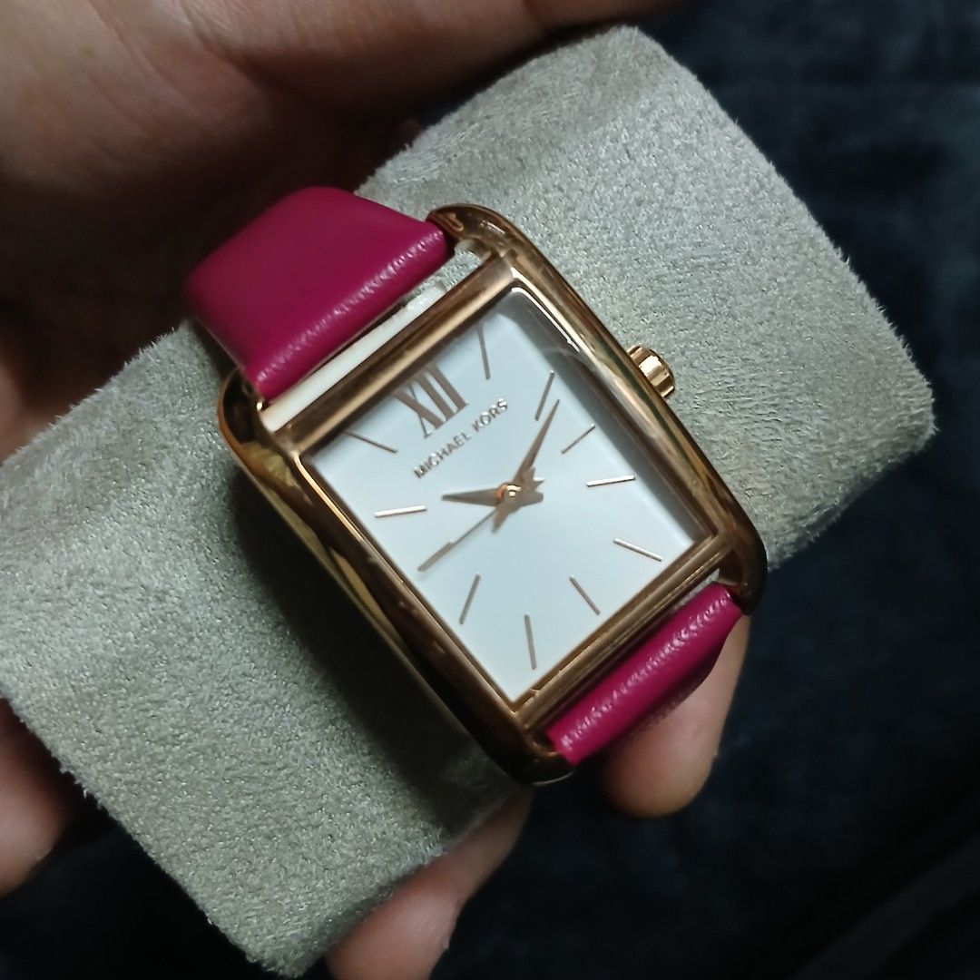 Authentic Michael Kors Monroe Square Electric Pink Leather Watch (Category: Women's Watches) located in Cagayan de Oro. Submitted by susanthrifts (Listing ID 1448611270, Image 1). Description: -Authentic Michael Kors Watch - Rose Gold Tone Casing - Square Face - White Dial with Roman Numerals - Bright Pink Genuine Leather Strap - Buckle Closure with Michael Kors Logo - Model: MK01029 It was a gift from US pato. Never nya na gamit. The owner decid
