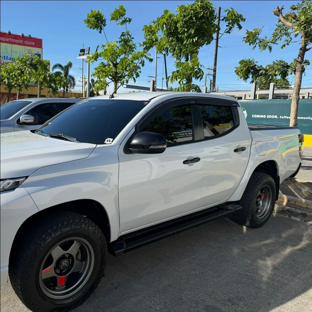 Mitsubishi strada Manual (Category: Used Cars) located in San Pedro. Submitted by benbravo14 (Listing ID 1448502279, Image 3). Description: 2023 Mitsubishi Strada Black Series Manual Transmission 75k odo 1st Owner Complete Papers All Stock Aftermarket Rims Complete Stepsills 3m Tint Super Fresh Complete Manuals and Booklet Complete Maintenance Record 2 Keys See to appreciate, rush sale 820k nego !!! Call/ Text 09209765047, 09167485939.
