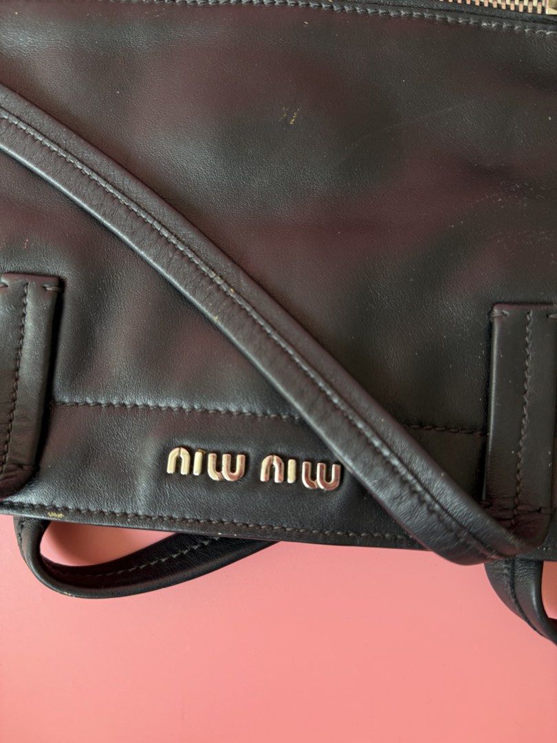 Miu miu tote 💯 authentic (Category: Luxury Bags & Wallets) located in Manila. Submitted by _prettyquick (Listing ID 1448487393, Image 3). Description: preowned pls manage your expectations 100% authentic Follow us on instagram for more items @_prettyquick.