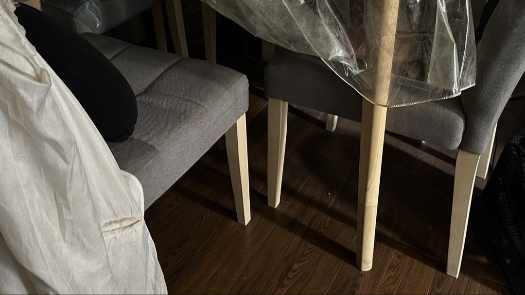 Modern Dining Table with 4 Grey Chairs (Category: Tables & Sets) located in Muntinlupa City. Submitted by clairebobot (Listing ID 1448627754, Image 3). Description: - Elegant dining table set perfect for any dining area. - Features a sturdy table with a light-colored, marble-effect top and safe rounded edges. - Includes four comfortable grey upholstered dining chairs. - Chairs have stylish light wood legs..