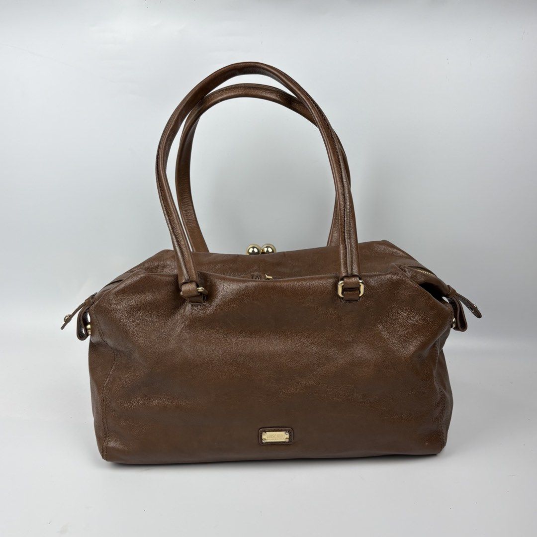 Moschino - Cheap and Chic - Leather Hand Bag (Category: Luxury Bags & Wallets) located in Bacolod City. Submitted by cast.archives (Listing ID 1448667891, Image 2). Description: Moschino - Cheap and Chic - Leather Hand Bag Size: Large Condition: Very good Flaw: Normal sign of used.