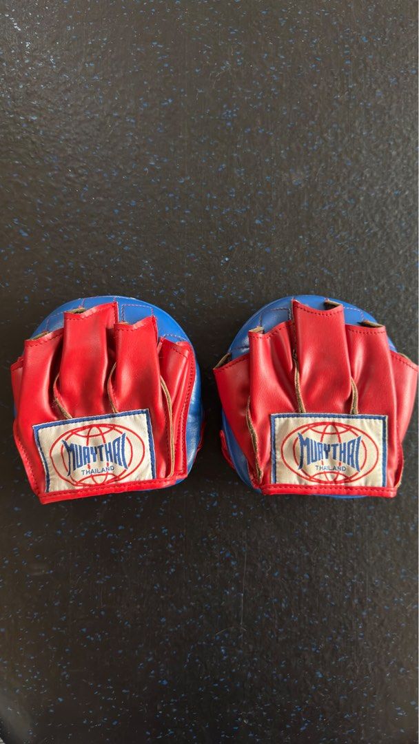Muay Thai Thailand Boxing Mitts (Category: Combat Sports) located in Quezon City. Submitted by digitalthrifting (Listing ID 1448548166, Image 1). Description: - Muay Thai boxing mitts RFS: decluttering, no longer in use. Bought during the pandemic. .