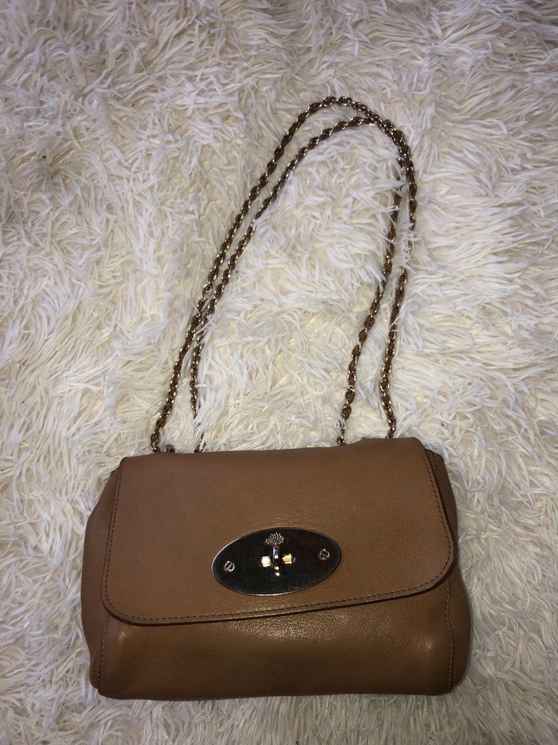 Mulberry Tan Leather Medium Lily Shoulder Bag (Category: Luxury Bags & Wallets) located in Daraga. Submitted by koko1630 (Listing ID 1448684602, Image 1). Description: Mulberry Tan Leather Medium Lily Shoulder Bag Gender: Women Includes: The Luxury Closet Packaging Hardware: Gold Tone Exterior Material: Leather Interior Material: Suede Origin: Turkeys Color: Tan Length: 28 cm Width: 10.5 cm Height: 20.5 cm Shoulder Strap: 30-54 cm.