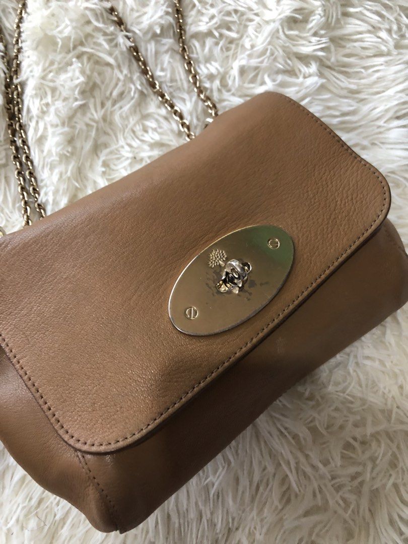 Mulberry Tan Leather Medium Lily Shoulder Bag (Category: Luxury Bags & Wallets) located in Daraga. Submitted by koko1630 (Listing ID 1448684602, Image 2). Description: Mulberry Tan Leather Medium Lily Shoulder Bag Gender: Women Includes: The Luxury Closet Packaging Hardware: Gold Tone Exterior Material: Leather Interior Material: Suede Origin: Turkeys Color: Tan Length: 28 cm Width: 10.5 cm Height: 20.5 cm Shoulder Strap: 30-54 cm.