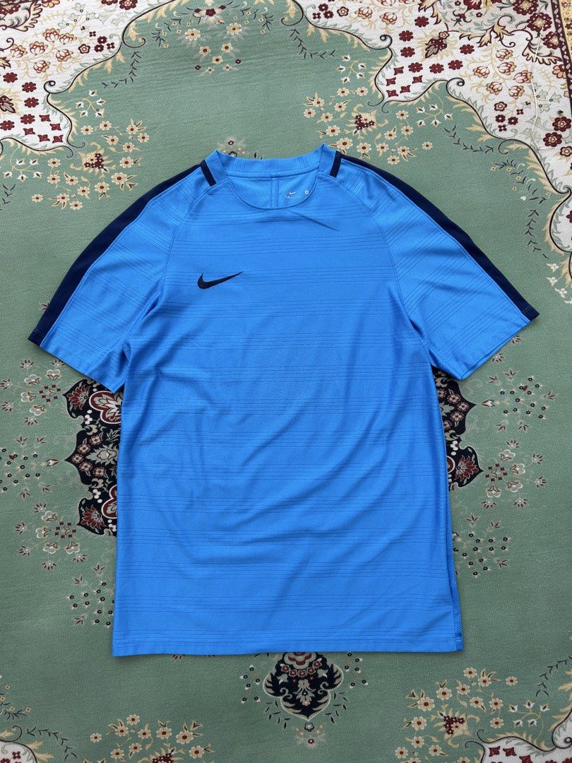 Nike Dri-fit Tee (Category: Activewear) located in Angeles City. Submitted by outboxph (Listing ID 1448637587, Image 2). Description: CODE: Pi32 Authentic/Legit with tag and wash tag Size: XL on tag Dimensions: 29L x 20W Sleeve Length: 8L Condition: 9/10 .