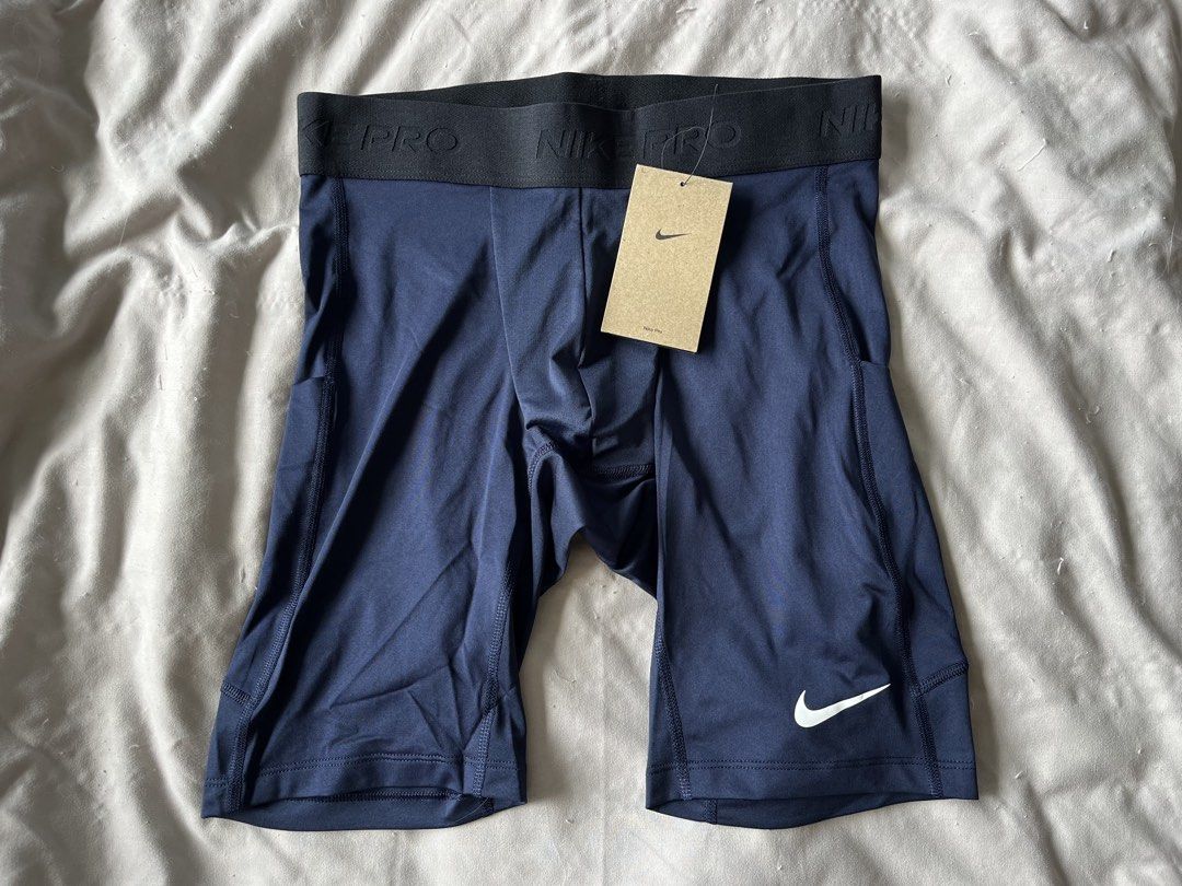 Nike Pro Men's Navy Compression Shorts Size M (Category: Activewear) located in Quezon City. Submitted by jamesjasonjimenez761 (Listing ID 1448567888, Image 2). Description: - Navy blue Nike Pro compression shorts - Size: Medium - Ideal for workouts and sports - Made with Dri-FIT technology for moisture-wicking - Elastic waistband with signature Nike Pro branding - Brand new with original tag still attached BRAND NEW AND ORIGINAL NIKE 1200 pesos 