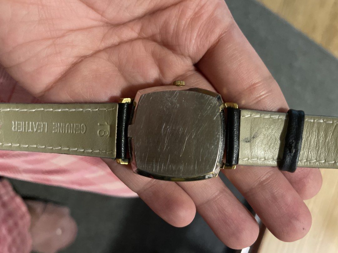 Omega Genève Automatic Gold Tone Watch (Category: Luxury Watches) located in Agdangan. Submitted by kikayfindsph (Listing ID 1448660419, Image 3). Description: - Vintage Omega Genève watch - Automatic movement with date function - Gold tone case and dial - Black leather strap - Runs well.