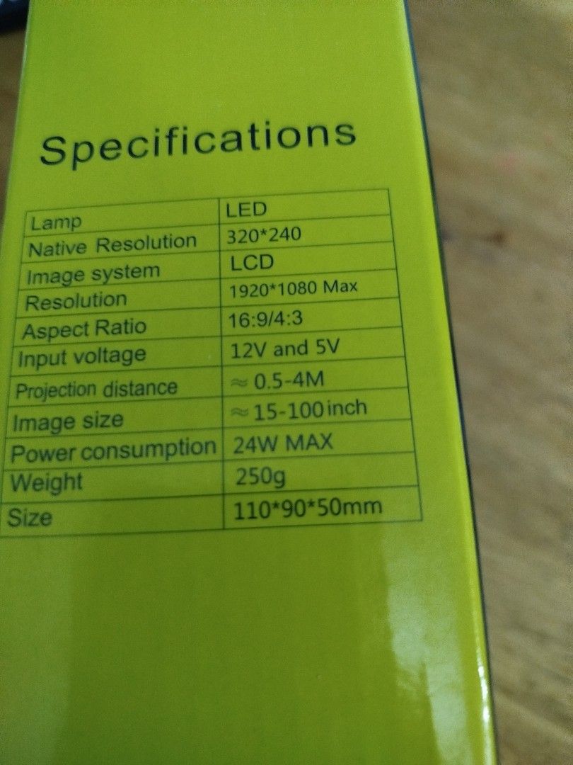 Optimus Mini LED Projector with Remote (Category: Projectors) located in Calamba. Submitted by aguilardominique (Listing ID 1448608522, Image 3). Description: - Mini LED projector by Optimus - Native resolution: 320x240 (supports up to 1920x1080) - Screen size: 15 to 100 inches - Projection distance: 0.5 to 4 meters - Wi-Fi ready - USB 2.0 port - Compact and lightweight (250g) - Comes with remote control.