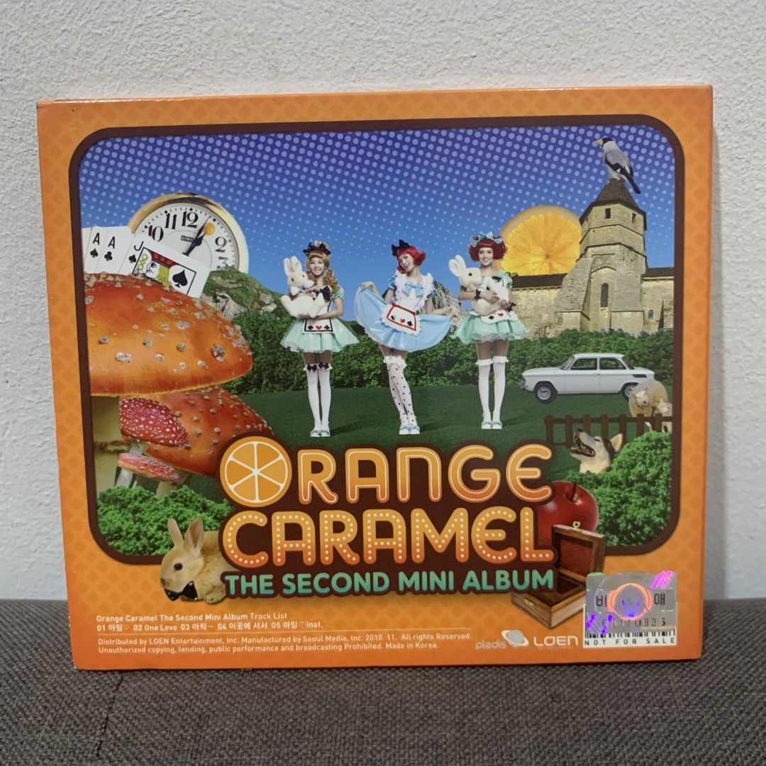 Orange Caramel The Second Mini Album K-pop CD (Category: CDs & DVDs) located in Cebu City. Submitted by _collectunbox_ (Listing ID 1448662810, Image 2). Description: - Orange Caramel The Second Mini Album CD - Released in 2010 - Includes CD and album booklet - Features members Nana, Lizzy, and Raina - Ideal for fans of After School and K-pop collectors - Tracklist includes 'One Love'.