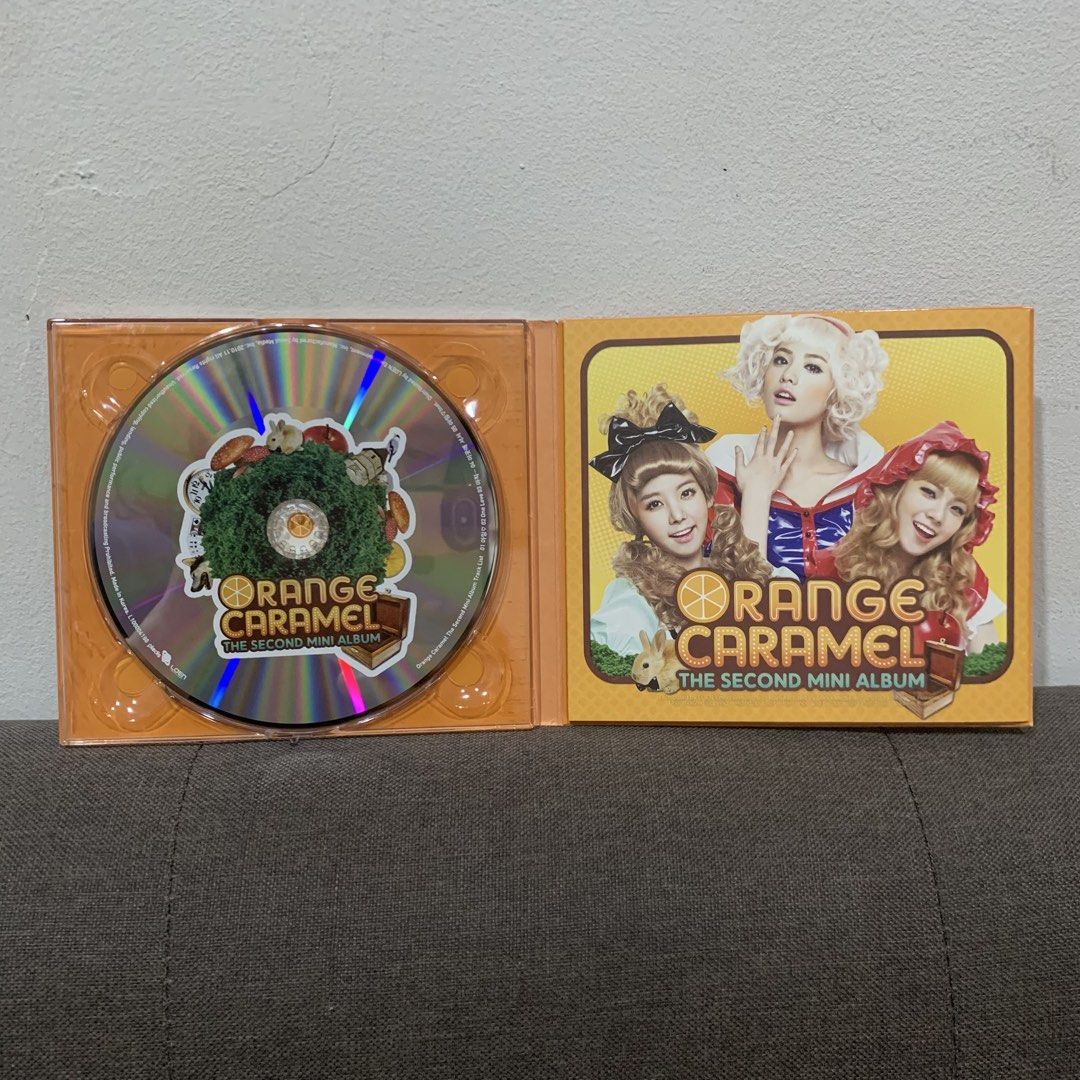 Orange Caramel The Second Mini Album K-pop CD (Category: CDs & DVDs) located in Cebu City. Submitted by _collectunbox_ (Listing ID 1448662810, Image 3). Description: - Orange Caramel The Second Mini Album CD - Released in 2010 - Includes CD and album booklet - Features members Nana, Lizzy, and Raina - Ideal for fans of After School and K-pop collectors - Tracklist includes 'One Love'.