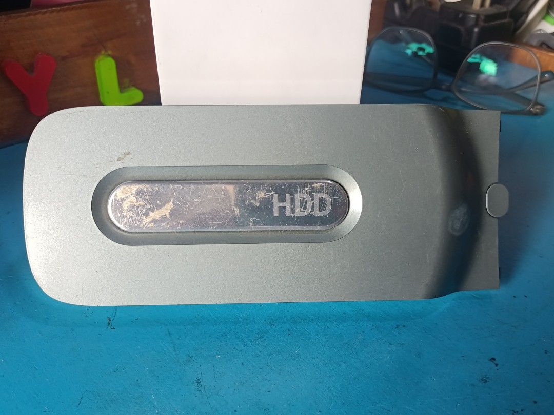 Original Xbox 360 HDD (Category: Cables & Chargers) located in Caloocan City. Submitted by red_rob (Listing ID 1448531572, Image 1). Description: Official HDD for Xbox 360 phat presumably 20gb Came from Japan Untested, wala ako xbox D ko rin alam kung may games Maayos na maayos physically Pajo caloocan.