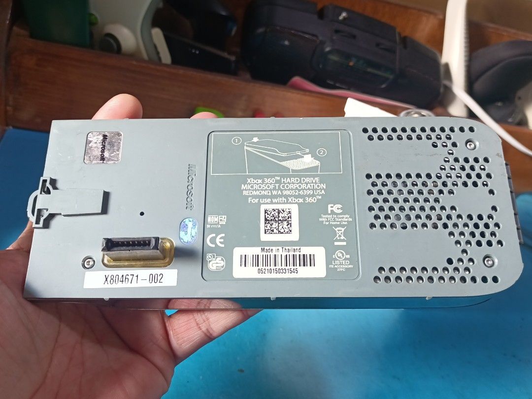 Original Xbox 360 HDD (Category: Cables & Chargers) located in Caloocan City. Submitted by red_rob (Listing ID 1448531572, Image 3). Description: Official HDD for Xbox 360 phat presumably 20gb Came from Japan Untested, wala ako xbox D ko rin alam kung may games Maayos na maayos physically Pajo caloocan.