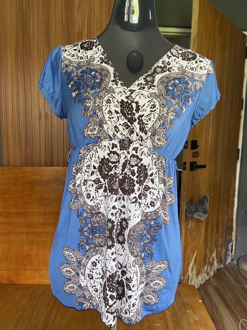 Paisley Blue Top with Brown and White Pattern | Y2K Summer Boho (Category: Sleeveless) located in Quezon City. Submitted by dottydollzbackup (Listing ID 1448597232, Image 3). Description: - Blue top with brown and white paisley print - V-neckline and short sleeves - Elasticated waist for a flattering fit - Lightweight fabric, perfect for casual wear - Versatile: pairs well with jeans or skirts.
