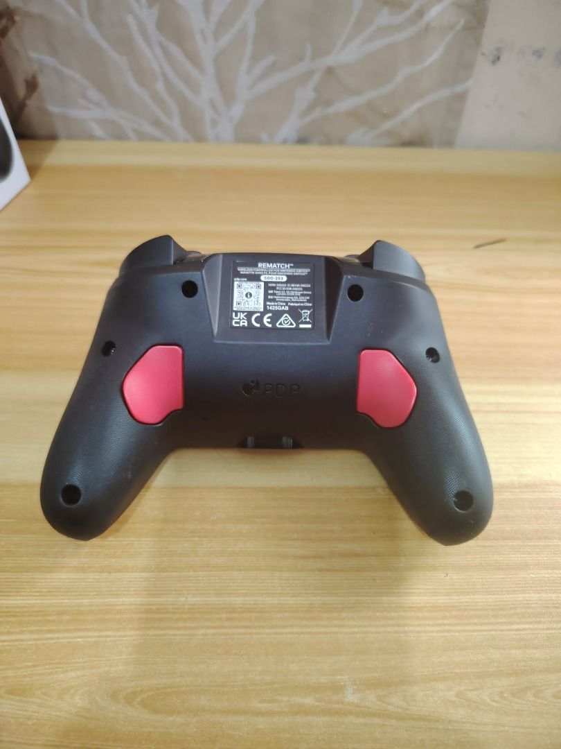 PDP Rematch Glow for Switch 2, Switch V1, V2, OLED (Category: Controllers) located in Paranaque City. Submitted by thebiskwitcompany (Listing ID 1448513537, Image 3). Description: PDP Rematch Glow Wireless Gaming Controller P1995 -Like New -No Issue (ghost touch, ghost analog, etc..) -Excellent battery life ***compatible with Switch 2, Switch 1, V1, V2 and OLED. Experience the thrill of the race with the Grand Prix Mario design Glows in the dark 