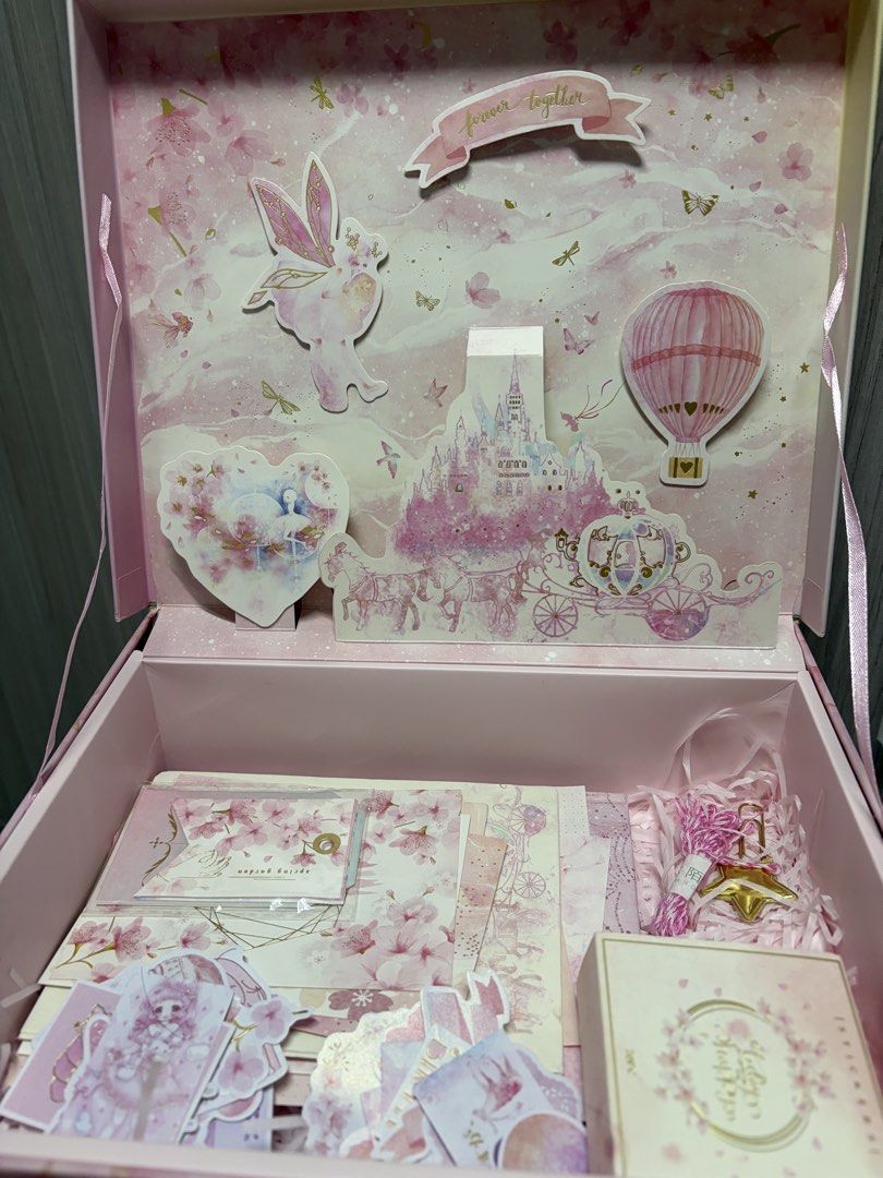 Pink princess Fairy Tale stationary bundle box (Category: Craft Supplies & Tools) located in Taguig. Submitted by labellearmoire2 (Listing ID 1448693565, Image 1). Description: 3D/pop up Princess fairy tale box what you see is what you get (all inclusive). No notebook! Some stickers have been used already everything else is complete. Will be including extra stickers from my own collection as freebies. - Packed with stickers, washi tape, decorativ