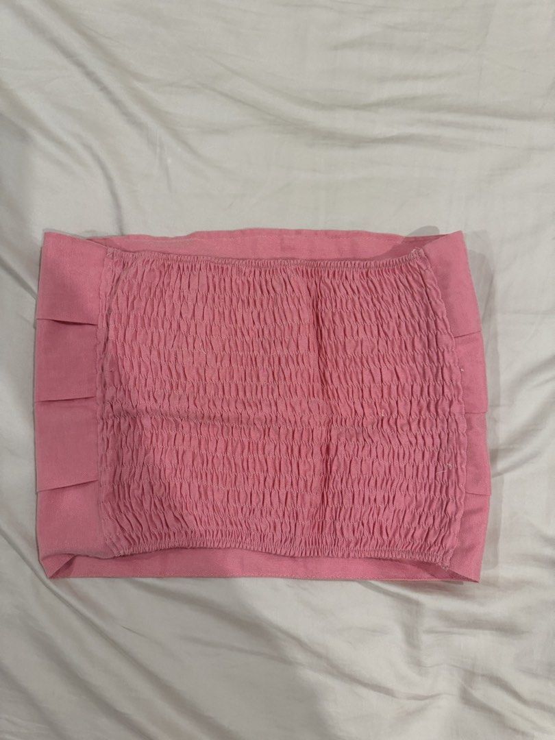 Pink Smocked Tube Top (Category: Sleeveless) located in Manila. Submitted by pinkyclothes1267 (Listing ID 1448595612, Image 2). Description: - Cute pink tube top - Smocked bust for a comfy, secure fit - Textured fabric adds a nice touch - Ideal for warm weather and casual wear - Versatile: pairs well with shorts, skirts, or as a layering piece.