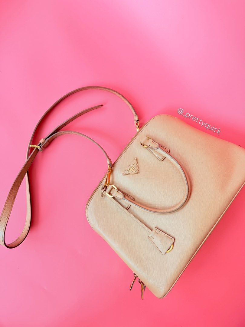 Prada dome promenade 💯 Authentic (Category: Luxury Bags & Wallets) located in Manila. Submitted by _prettyquick (Listing ID 1448490238, Image 1). Description: preowned pls manage your expectations 100% authentic Follow us on instagram for more items @_prettyquick.