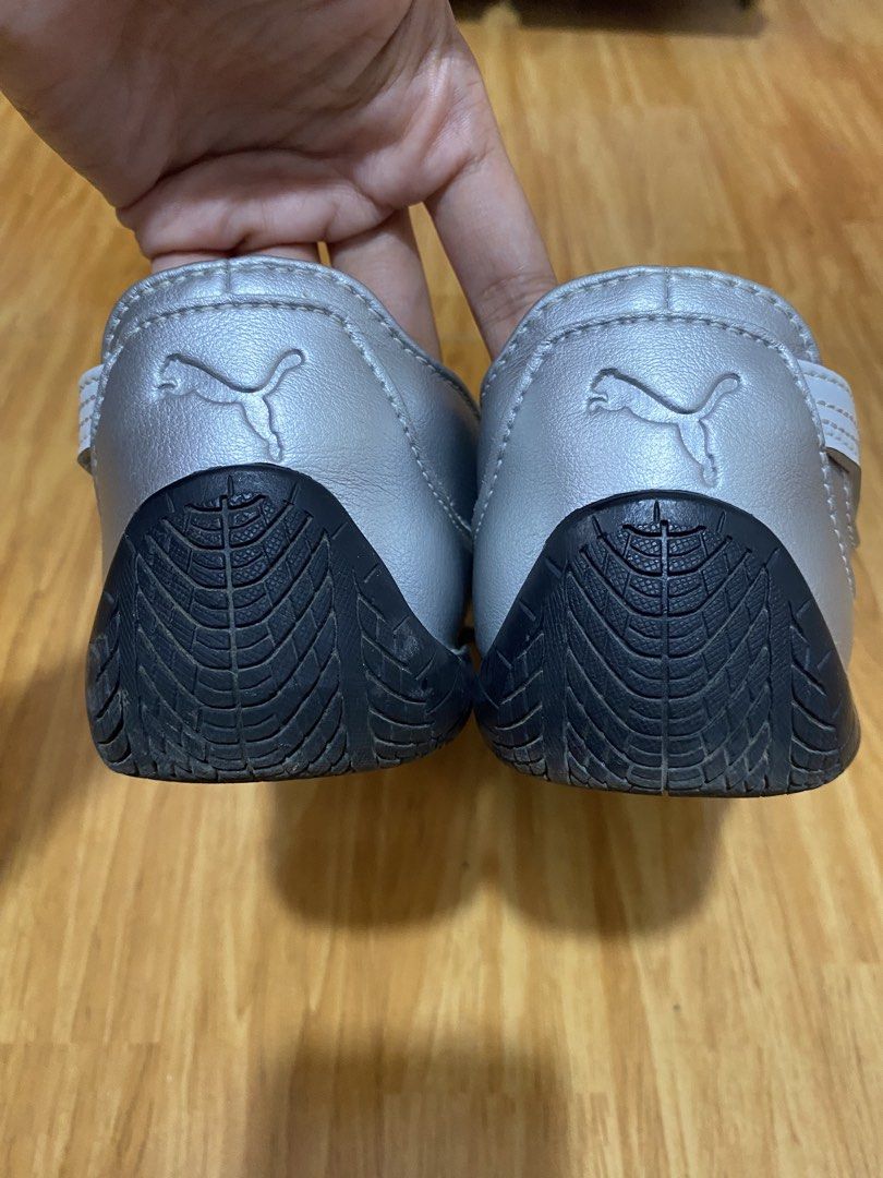 Puma Silver Ballerina Flats with Straps (Category: Flats & Sandals) located in Iloilo. Submitted by declutterbykid (Listing ID 1448511935, Image 3). Description: - Silver Puma ballerina flats - Elastic straps across the top for a secure fit - Puma logo detail on front and back - Tread pattern on soles for grip - Ideal for casual everyday wear Preloved Shoes only, no box Bought from Japan Negotiable .