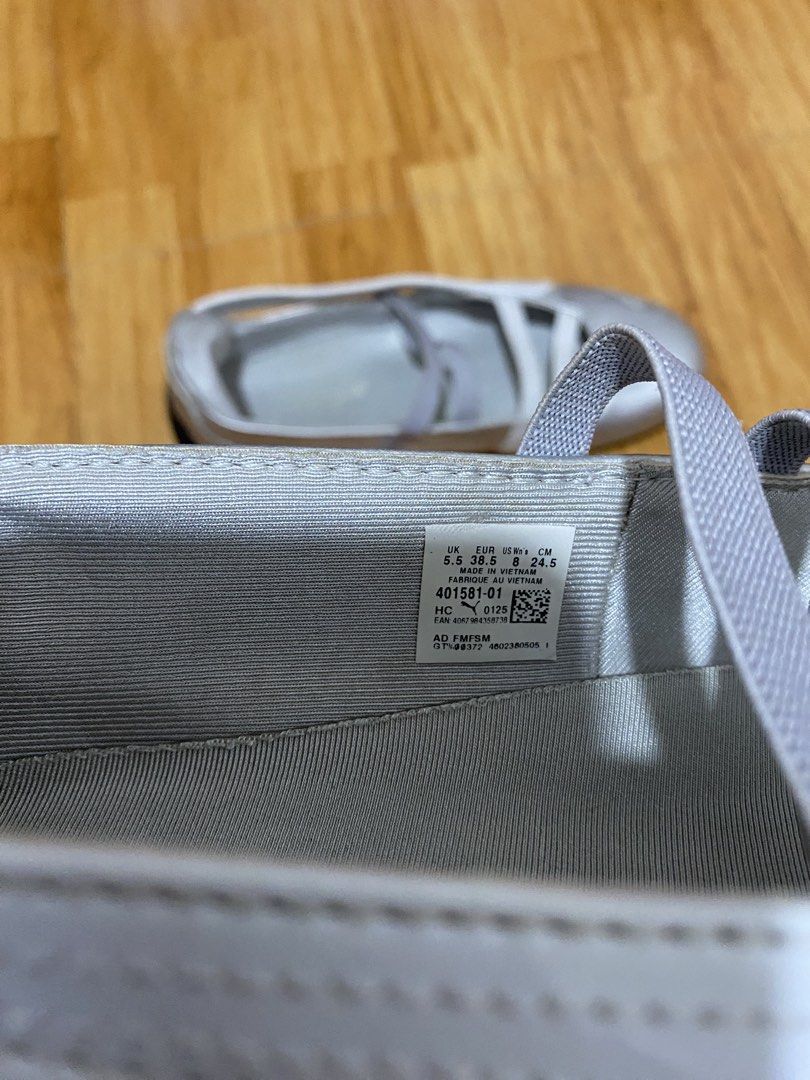 Puma Silver Ballerina Flats with Straps (Category: Flats & Sandals) located in Iloilo. Submitted by declutterbykid (Listing ID 1448511935, Image 2). Description: - Silver Puma ballerina flats - Elastic straps across the top for a secure fit - Puma logo detail on front and back - Tread pattern on soles for grip - Ideal for casual everyday wear Preloved Shoes only, no box Bought from Japan Negotiable .
