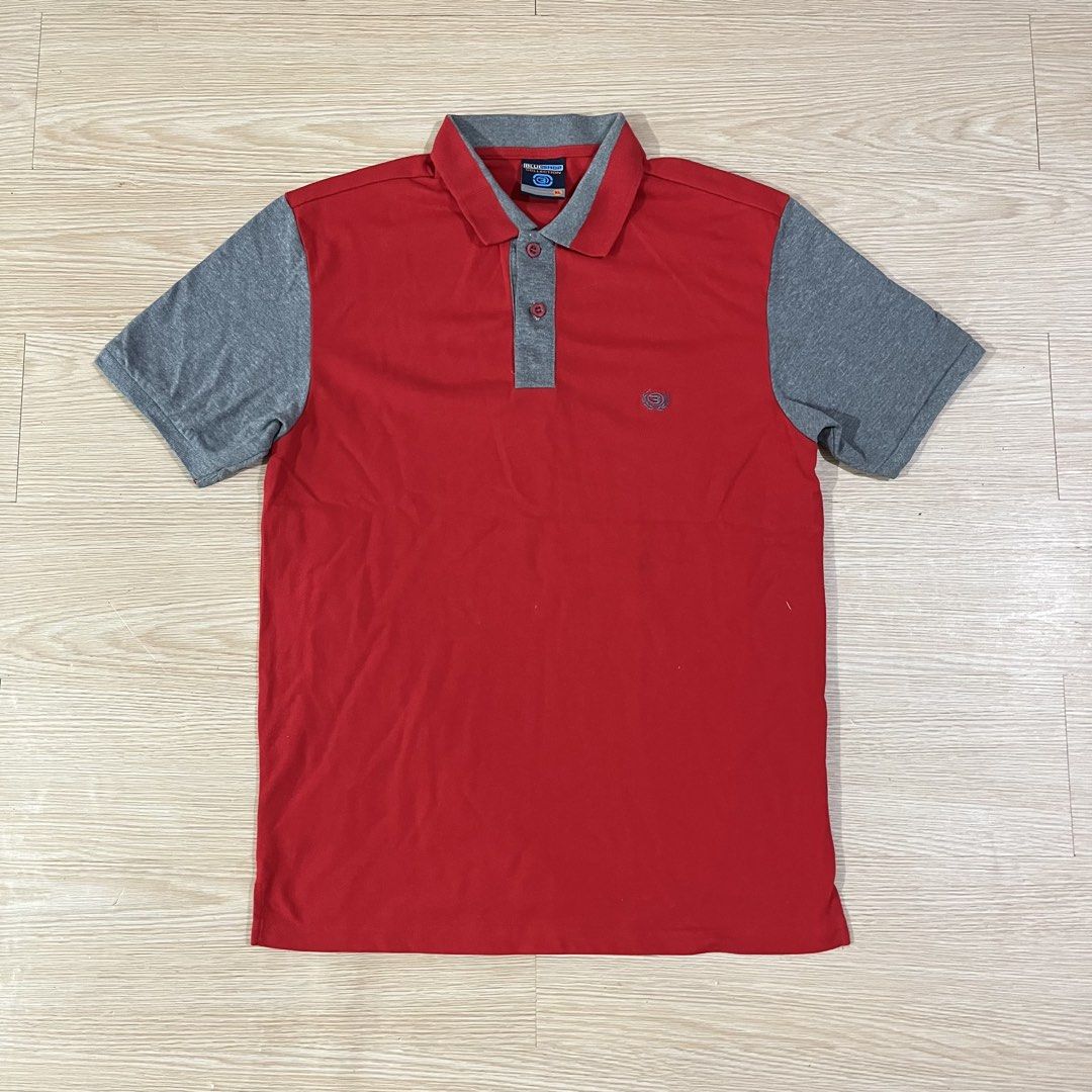 Red & Grey Short Sleeve Polo Shirt (Category: Tshirts & Polo Shirts ) located in Catarman. Submitted by gadabells (Listing ID 1448524009, Image 1). Description: - Classic red polo shirt - Grey sleeves and collar - Two-button placket - Small embroidered chest logo - Comfortable fabric - Perfect for casual or sporty looks - Easy to pair with jeans or shorts.