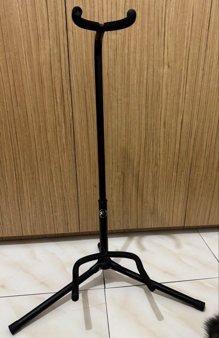 RJ Guitars - RJ Basics Black Guitar Stand (Category: Musical Instruments) located in Pasig City. Submitted by imzlorin (Listing ID 1448518471, Image 2). Description: ❕READ FIRST❕ RJ Guitars - RJ Basics Black Guitar Stand - Traditional Guitar Stand - Specifications: * Folding legs * Neck fork with safety strip * Heavy duty steel construction * Portable and easy to assemble * Non-slip rubber end caps - RJ Traditional stand is perfect for your acous