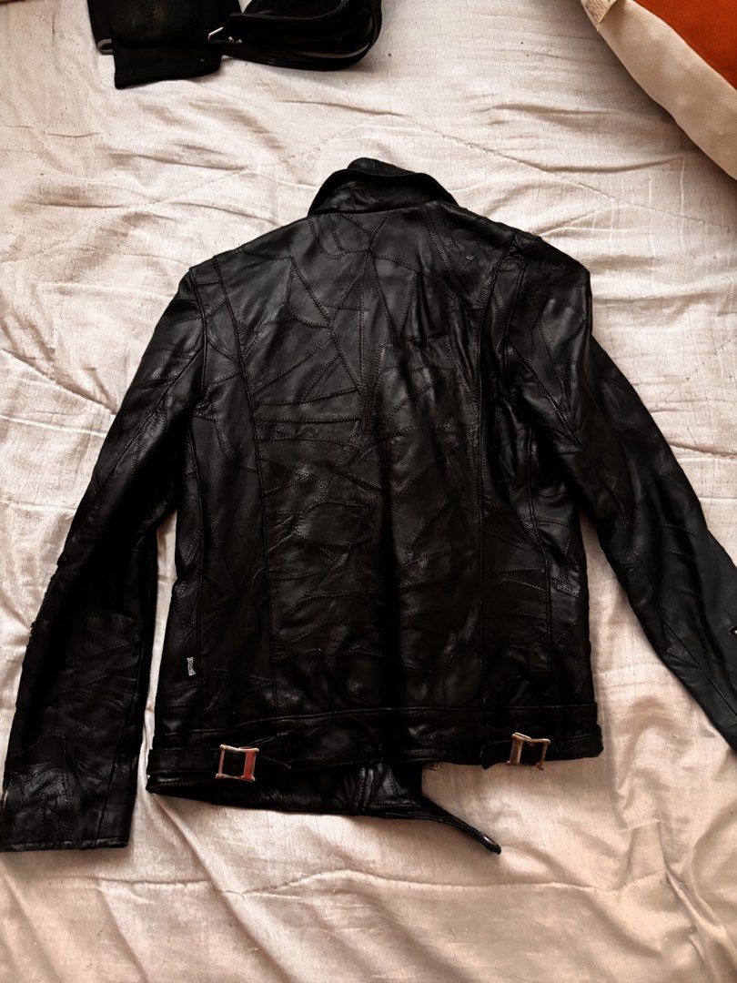 RNA Slang Black Leather Biker Jacket with Unique Lining (Category: Coats, Jackets and Outerwear) located in Reina Mercedes. Submitted by sukieiri15197 (Listing ID 1448552250, Image 3). Description: .𖥔 ݁ ˖╭ ┆RNA slang leather jacket ╰⊹ ࣪ ༉‧₊˚. pre-loved. bought 3 years ago ༉‧₊˚. used once on a trip. been stocked ever since ༉‧₊˚. has issues (see photos for the issue) ༉‧₊˚. sleeves: 14cm | size medium (but it can fit small since i have big arms and