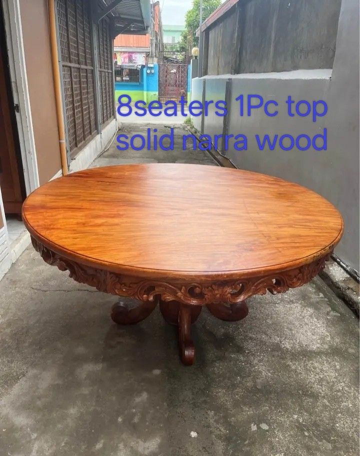 Round table 1Piece top 60inchs narra (Category: Tables & Sets) located in Manila. Submitted by carmelites36250 (Listing ID 1448511337, Image 1). Description: *Round table 8 seaters 60" Dia❤ *1Piece top Solid narra wood 🎯❤ *Beautiful sided Full carvings ✅✅ *Pick up @shop /Delivery 🚚✅🚚 *Pm me ☎☎☎☎ *Price-32000 #forsale.