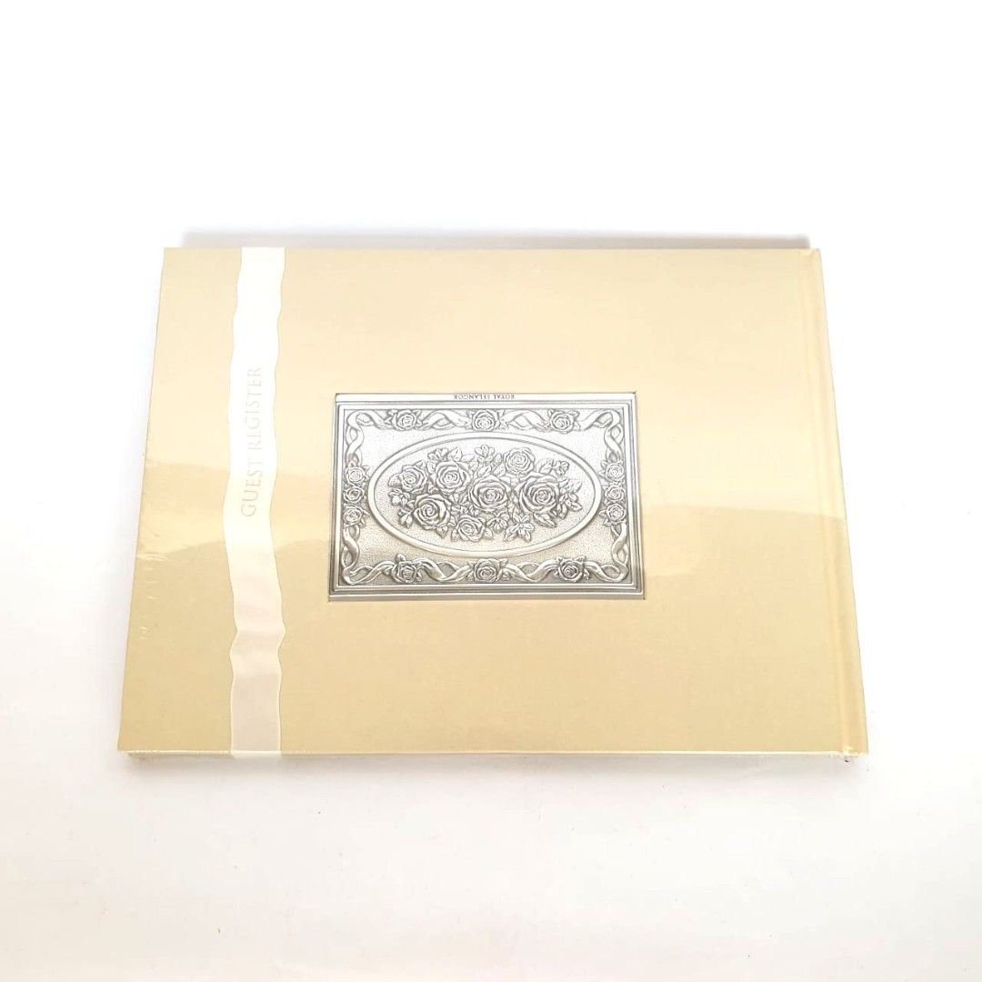 Royal Selangor Guest Registry Book (Category: Others) located in Kuala Lumpur. Submitted by cheshirsky (Listing ID 1448513139, Image 1). Description: This is an elegant Royal Selangor guest register featuring an oval pewter medallion with rose detailing. It is designed as a keepsake for special events like weddings or anniversaries..