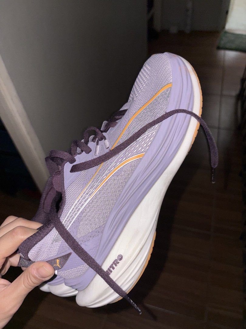 Running Shoes (Category: Sports & Fitness Nutrition) located in Pasig City. Submitted by cerealkiller23 (Listing ID 1448550982, Image 2). Description: - PUMA Nitro Deviate 3 - Only used 7 times for 1-3k runs - Issue in photos - Light purple Puma running shoes - Dark purple laces - Equipped with PWRPLATE and NITRO technology - Orange and white soles - Negotiable .
