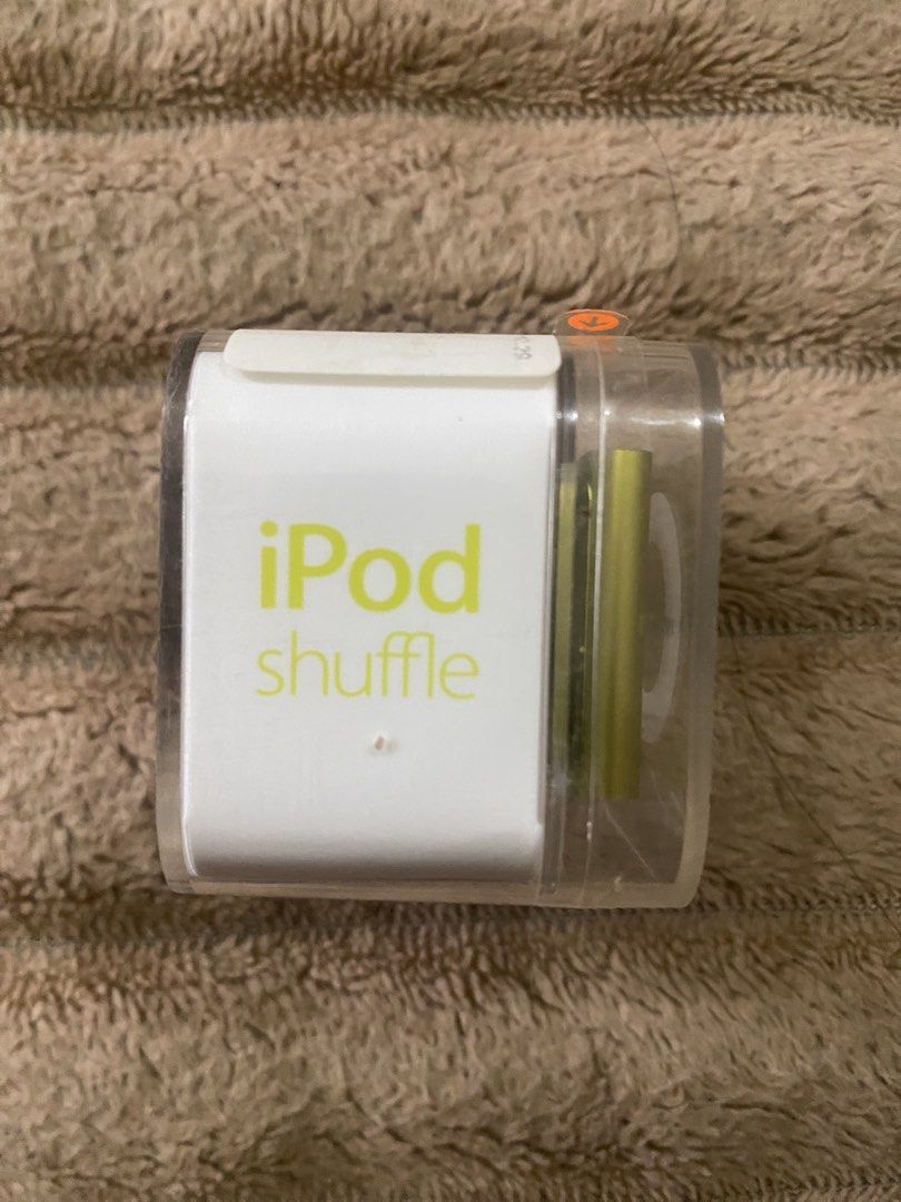Sealed Ipod Shuffle 2GB (Category: Portable Music Players) located in Manila. Submitted by dionnivs (Listing ID 1448540656, Image 3). Description: Yellow 2GB Ipod Shuffle 4th Gen Unopened Sealed unused.