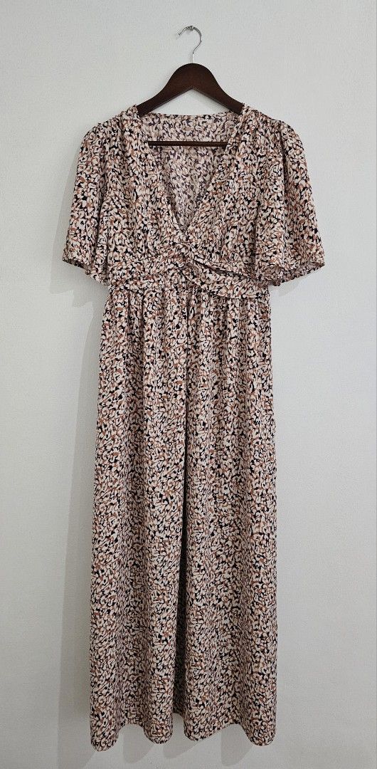 SHEIN Dresses - Take All (Category: Jumpsuits) located in Antipolo. Submitted by secondbloomph (Listing ID 1448630741, Image 1). Description: - Adorable floral print jumpsuit - Flattering V-neckline - Cinched waist with adjustable tie - Cute flutter sleeves - Versatile for casual or night out occasions - Comfortable and stylish design.