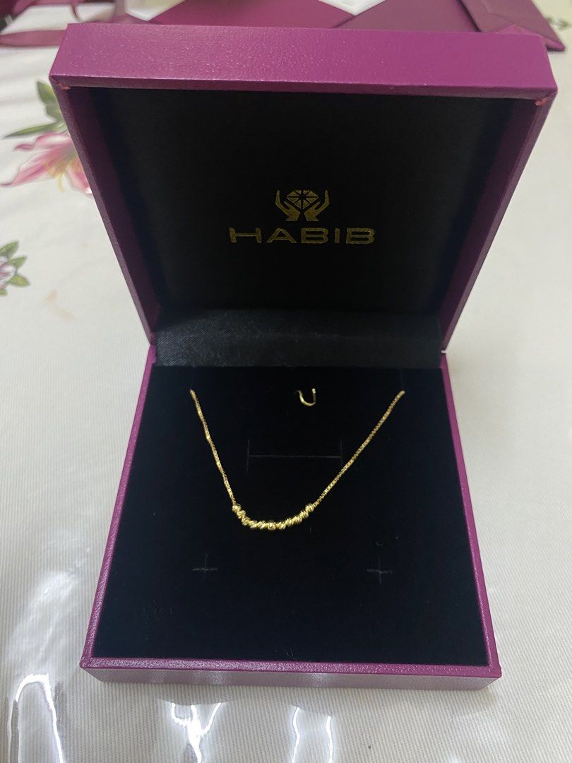 Silver HABIB bracelet (Category: Bracelets) located in Kuala Lumpur. Submitted by shoppingkeder (Listing ID 1448555908, Image 3). Description: - Genuine gold necklace from Habib - Delicate chain with small, textured beads - Includes original Habib box - Versatile for everyday or special occasions - Excellent gift option.