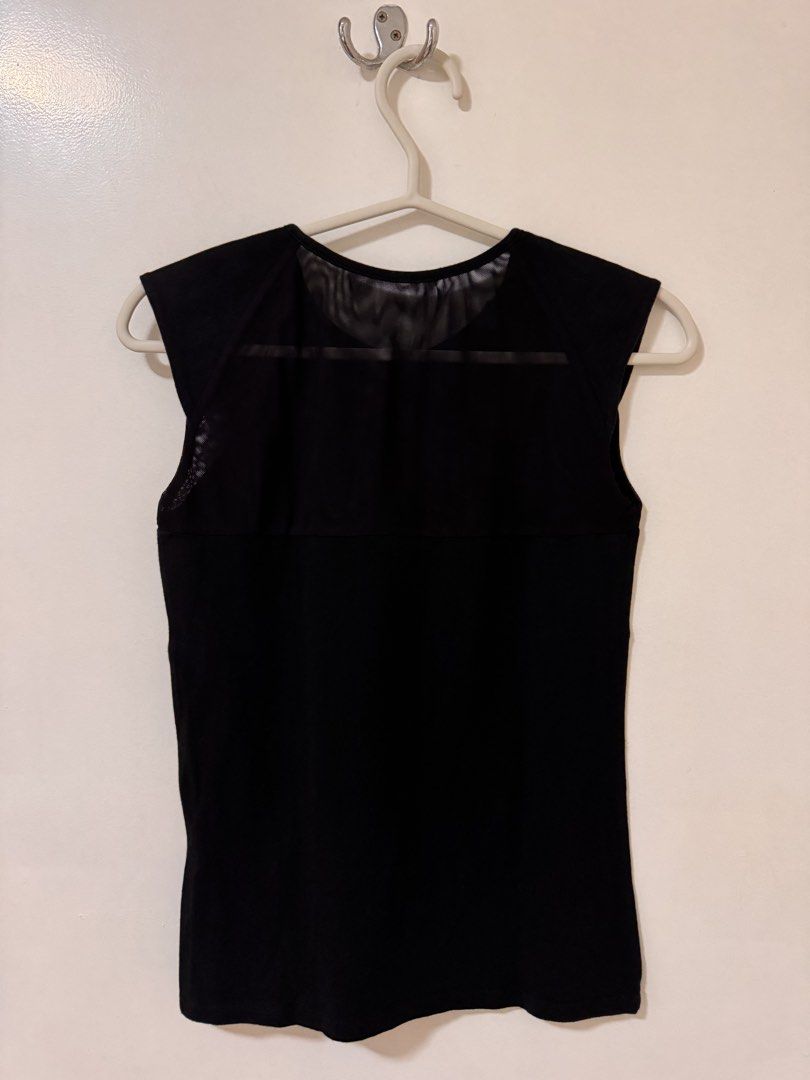Sleevless Black Top with Semi-Sheer Shoulder and Back Panels (Category: Sleeveless) located in Mandaluyong City. Submitted by axos723 (Listing ID 1448573578, Image 2). Description: ➡️Please read item description carefully below (click read more 👇) ➡️Item is AVAILABLE ➡️Guaranteed 💯 %Authentic ➡️1-Day Reservation only ➡️First to pay gets the item ➡️For SURE BUYERS only please. -Price: P 150+SF -Brand:2068 -Size: Small -Color: Black (Color may va