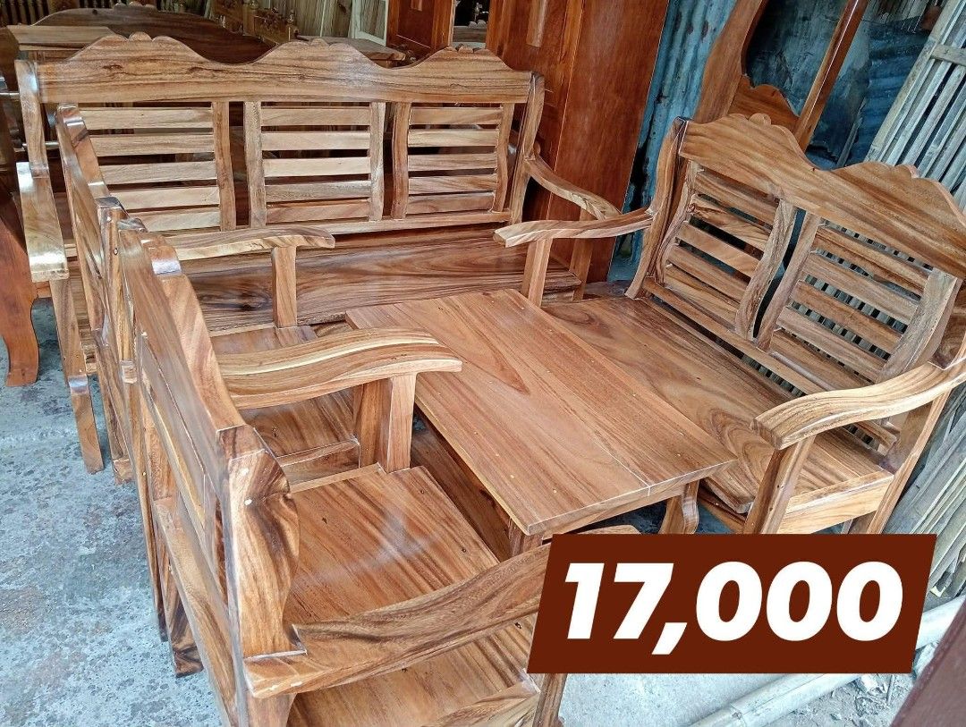 Solid Wood Living Room Sofa Set with Coffee Table (Category: Sofas) located in Iloilo. Submitted by semicglinda (Listing ID 1448599485, Image 1). Description: - Complete Solid Wood Sofa Set - Includes: 1x 3-seater sofa, 2x armchairs, 1x coffee table - Features beautiful natural wood grain - Classic design, perfect for any home - Ideal for family gatherings and relaxation - Selling as a complete set only - Message for dimensions.