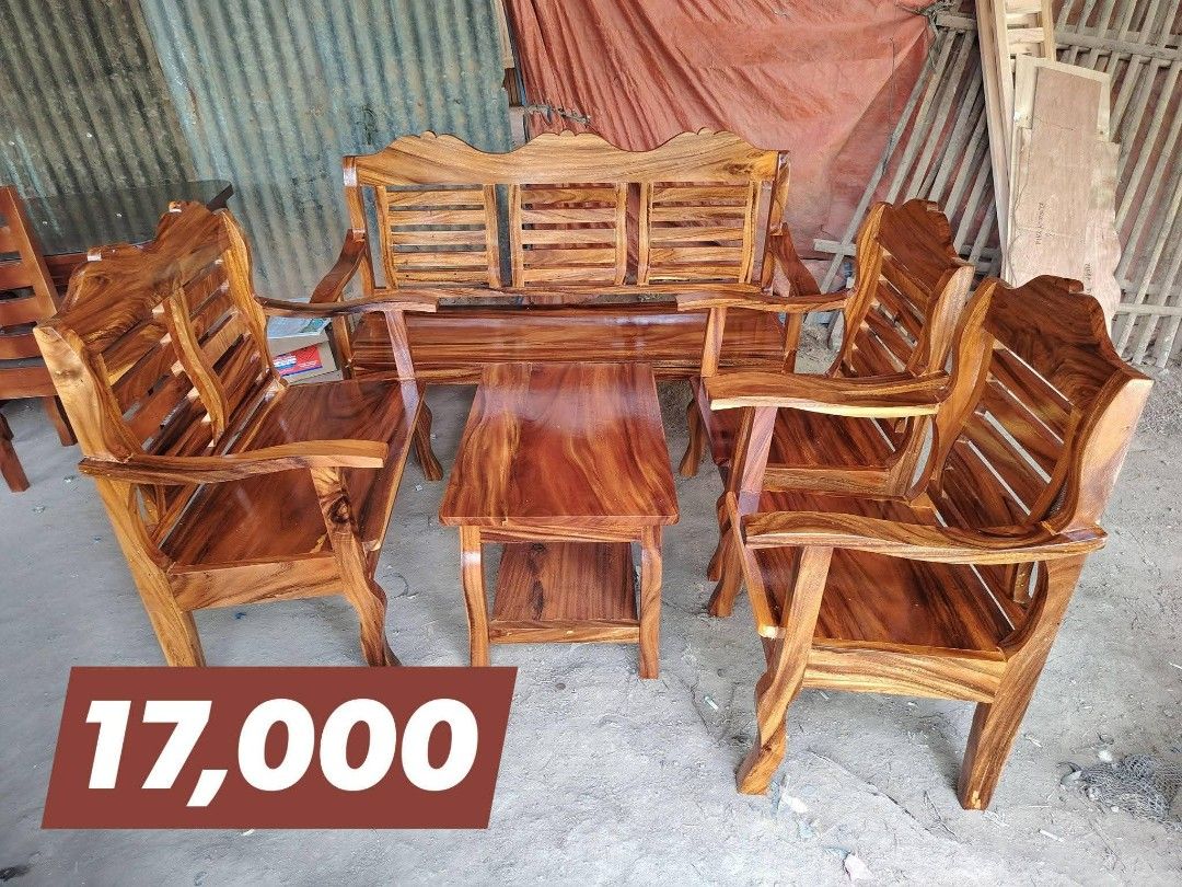 Solid Wood Living Room Sofa Set with Coffee Table (Category: Sofas) located in Iloilo. Submitted by semicglinda (Listing ID 1448599485, Image 2). Description: - Complete Solid Wood Sofa Set - Includes: 1x 3-seater sofa, 2x armchairs, 1x coffee table - Features beautiful natural wood grain - Classic design, perfect for any home - Ideal for family gatherings and relaxation - Selling as a complete set only - Message for dimensions.
