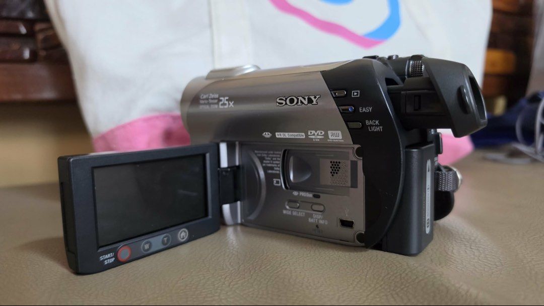 SONY HANDYCAM DCR-DVD308 Camcorder (Category: Video Cameras) located in Quezon City. Submitted by rebekkapacs29 (Listing ID 1448689855, Image 3). Description: SONY HANDYCAM DCR-DVD308 > 1/6 inch CCD sensor > Carl Zeiss Vario-Tessar lens with 25x optical zoom > 2.7-inch touch-panel LCD screen Comes with: Bag 3 DVD RW Charger w/ 1 extra battery USB connector wire.
