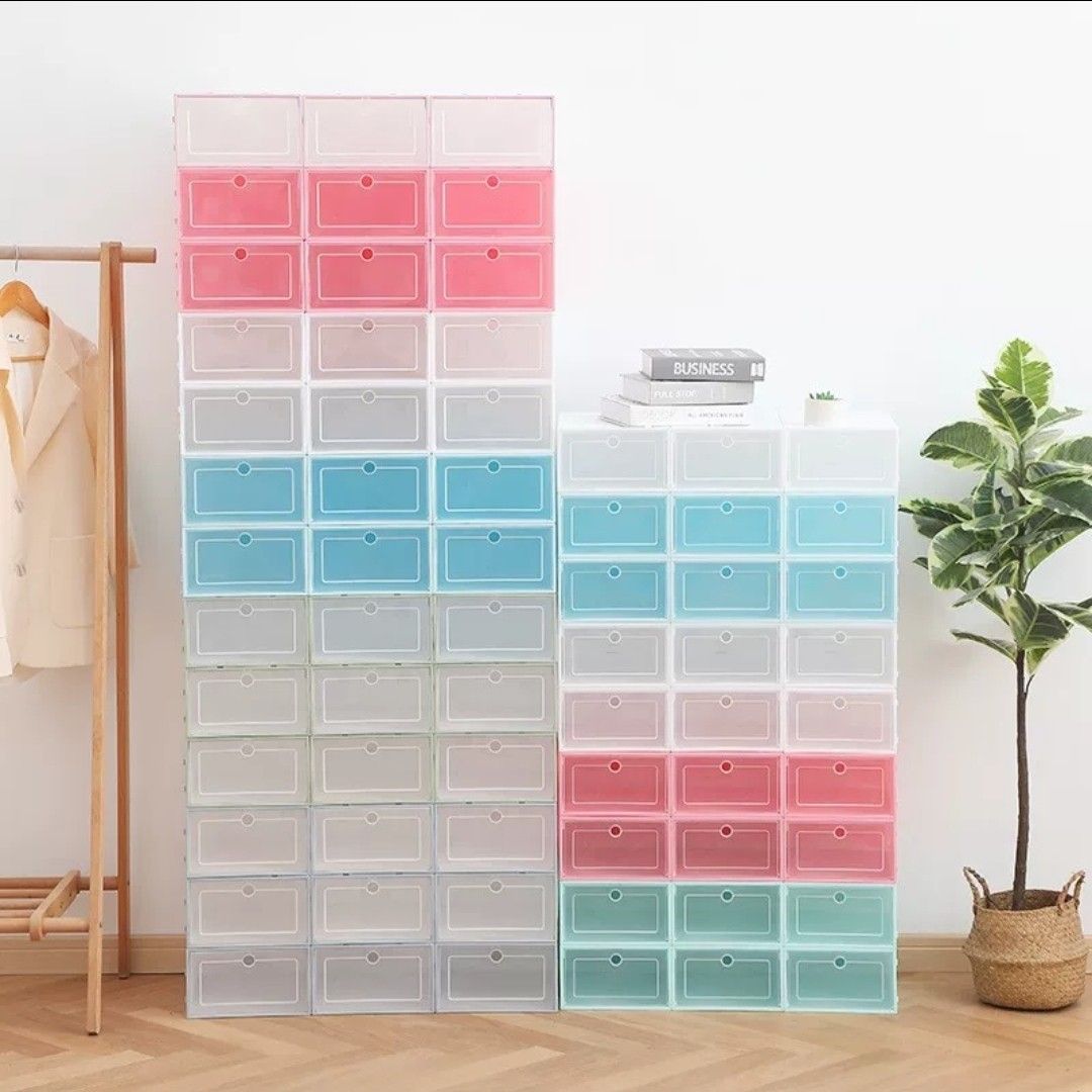 Stackable shoe rack boxes (Category: Shelves, Cabinets & Racks) located in Singapore. Submitted by erica.29 (Listing ID 1448612486, Image 3). Description: Clean and neat aesthetic for your unlimited shoes! Comes in white, red, blue, green! - Easy to assemble - Maximise your room space Minimum 6 boxes per order.